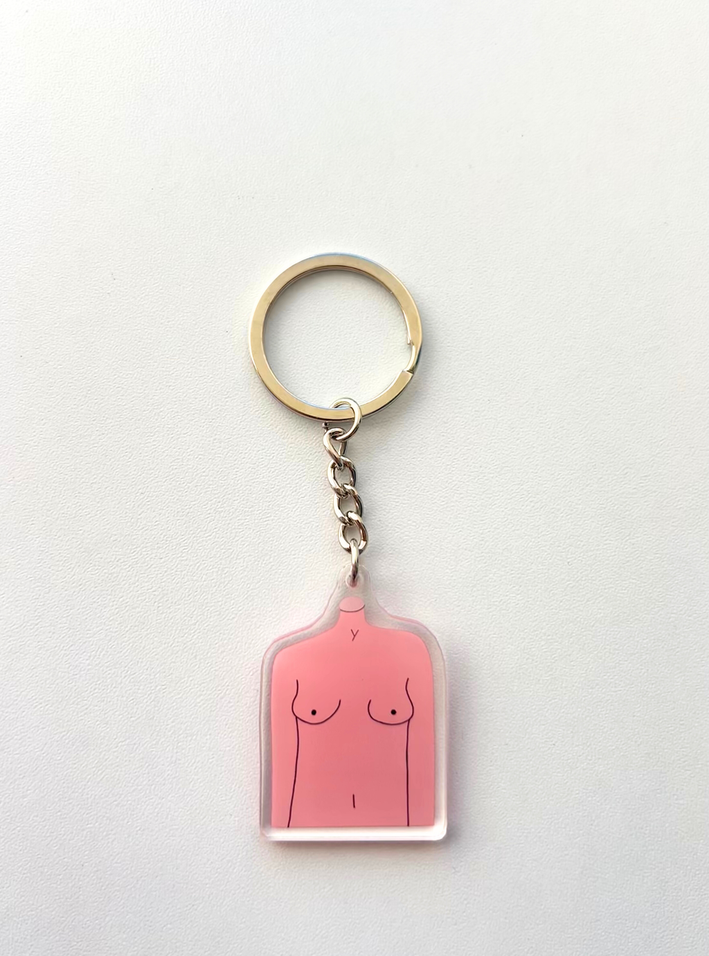 Portachiavi in acrilico – Corpo femminile minimal rosa (4 cm)